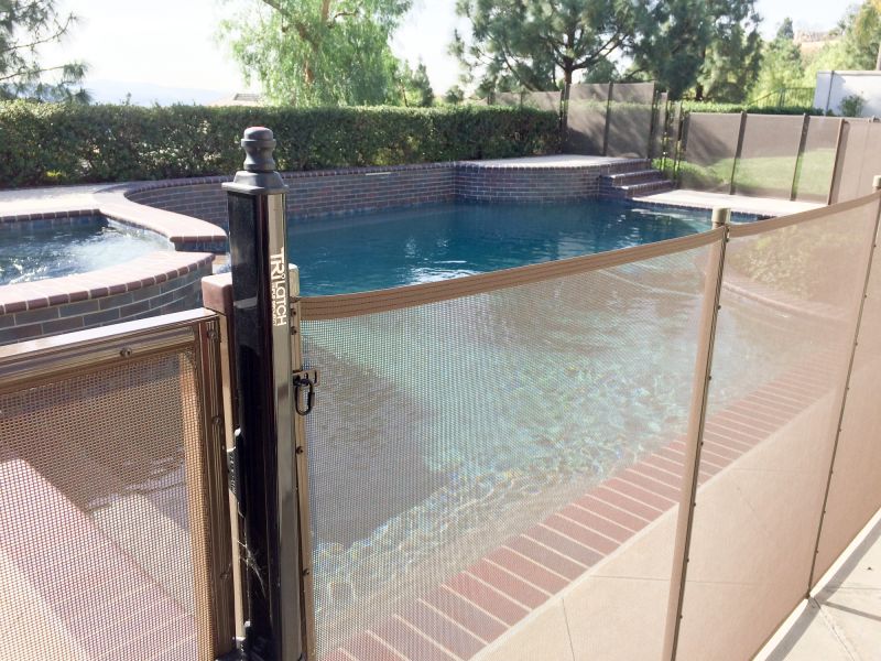 Pool with Mesh Fence Barrier